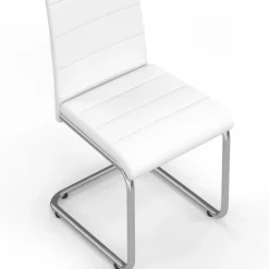 Chaises blanches de salle à manger