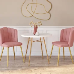Chaises coquillage rose en velours et pieds dorés