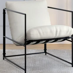 Fauteuil rembourré structure métal et coussin blanc