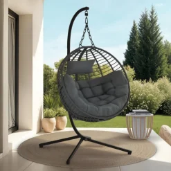 Fauteuil rond suspendu ajouré effet rotin gris avec coussin gris