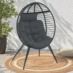 Fauteuil œuf sur pied ajouré gris effet rotin avec coussin gris
