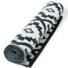 Grand tapis noir pour terrasse et extérieur